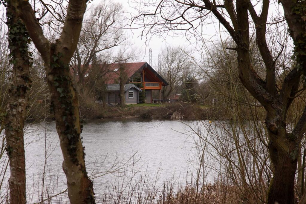 Somerford Lake in the Cotswold Water Park, the setting for Log House Holidays' cabins with wild swimming on site